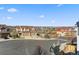 Two-story home with a three car garage, landscaped front yard, and scenic neighborhood view at 1828 Blue Oak Ct, Castle Rock, CO 80104