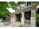 Inviting front porch with decorative columns and ample space for seating offers a relaxing outdoor area at 3644 Wabash St, Denver, CO 80238