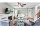 Bright living room with a cozy fireplace and neutral decor provides a comfortable and inviting atmosphere at 3644 Wabash St, Denver, CO 80238