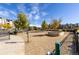 Well-maintained dog park with seating, landscaping, and waste disposal station for pet owners at 420 E Fremont Pl # 309, Centennial, CO 80122