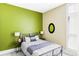 Bright bedroom features a comfortable bed, stylish decor, and ample natural light at 2432 Champa St, Denver, CO 80205