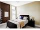 Cozy bedroom with a comfortable bed, neutral colors, and natural light at 2432 Champa St, Denver, CO 80205