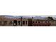 Scenic city view of building rooftops with snow-capped mountains in the distance at 2432 Champa St, Denver, CO 80205