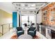 Stylish flex room with bar and garage door to deck, perfect for entertaining and relaxing at 2432 Champa St, Denver, CO 80205