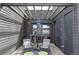 Outdoor patio featuring a pergola with hanging lights, seating, and stylish decor at 2432 Champa St, Denver, CO 80205
