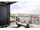 Relaxing rooftop deck perfect for entertaining with comfortable seating and city views at 2432 Champa St, Denver, CO 80205