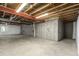 Large unfinished basement with concrete flooring and partially insulated walls, ready to be customized at 22163 E Calhoun Pl, Aurora, CO 80016