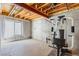 Spacious unfinished basement with a window and exercise equipment, ready for personalization at 22163 E Calhoun Pl, Aurora, CO 80016