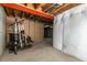 Unfinished basement with exposed ceiling and equipment, offering customization potential at 22163 E Calhoun Pl, Aurora, CO 80016
