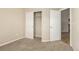 Bedroom with carpet and sliding closet with shelving at 22163 E Calhoun Pl, Aurora, CO 80016