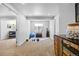 Finished basement area features an exercise space with golf clubs, yoga mat, and fitness equipment at 18126 E Alamo Dr, Centennial, CO 80015