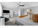 Spacious main bedroom with carpet and access to hallway and ensuite bathroom at 18126 E Alamo Dr, Centennial, CO 80015