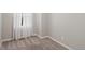 Bright bedroom featuring neutral paint, carpet, and base trim at 4762 S Clay Ct, Englewood, CO 80110