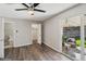 Spacious bedroom with ensuite bath, walk-in closet, and patio access at 4762 S Clay Ct, Englewood, CO 80110