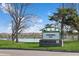 Centennial Park signage with beautiful lake in the background at 4762 S Clay Ct, Englewood, CO 80110