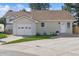 Charming home with attached garage, well-kept lawn, and inviting front entrance at 4762 S Clay Ct, Englewood, CO 80110