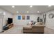 Living room with carpeted floors, recessed lighting and a large beige couch with chaise at 886 S Jersey St, Denver, CO 80224