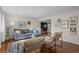 Comfortable living room featuring hardwood floors, neutral tones, and ample seating at 886 S Jersey St, Denver, CO 80224