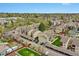 An aerial view of the complex features well-maintained buildings, covered parking, and landscaped green spaces at 7835 Barbara Ann Dr # C, Arvada, CO 80004