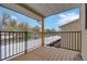 View from the outdoor balcony, featuring views of snowy scenery and exterior architecture at 7835 Barbara Ann Dr # C, Arvada, CO 80004