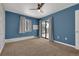 Bedroom featuring a sliding glass door leading to an outdoor balcony at 7835 Barbara Ann Dr # C, Arvada, CO 80004