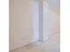 A bright, unfurnished room with white walls and carpet, presenting a blank canvas for customization at 8300 Fairmount Dr # J105, Denver, CO 80247