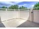 Enclosed patio with white fencing, providing a private and peaceful outdoor living space at 8594 W Quarto Ave, Littleton, CO 80128