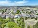 Panoramic aerial showcases the home's location with stunning views and proximity to community amenities at 1271 Sky Rock Way, Castle Rock, CO 80109
