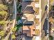Aerial view displays backyard spaces, including a custom patio, maintained lawns, and modern landscaping features at 1271 Sky Rock Way, Castle Rock, CO 80109