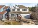 Charming two-story home featuring a two-car garage and well-maintained front yard at 1271 Sky Rock Way, Castle Rock, CO 80109