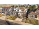 Residential homes with landscaped yards, garages, and inviting architecture at 1271 Sky Rock Way, Castle Rock, CO 80109
