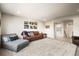 Comfortable living room with plush carpeting and stylish seating arrangement; perfect for relaxation at 1271 Sky Rock Way, Castle Rock, CO 80109
