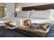 Close up of the main bedroom décor on the tray with wooden beaded string at 1271 Sky Rock Way, Castle Rock, CO 80109