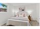 Cozy bedroom features stylish decor, a plush bed, and a bright window at 5640 Niagara St, Commerce City, CO 80022