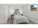 Quaint bedroom with comfortable furnishings and ample natural light from the window at 5640 Niagara St, Commerce City, CO 80022