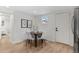 Bright dining area with a modern table setting, perfect for intimate meals and gatherings at 5640 Niagara St, Commerce City, CO 80022