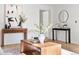 Cozy living room with modern decor, wood floors, and plenty of natural light at 5640 Niagara St, Commerce City, CO 80022