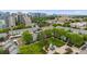 An aerial view of the townhome community surrounded by lush green trees and landscaping at 1150 Inca St # 43, Denver, CO 80204
