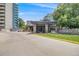 Attractive building entrance with stone columns, well-maintained landscaping, and clear signage at 1150 Inca St # 43, Denver, CO 80204