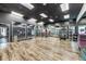 Large gym with weight machines, free weights, and mirrors, offering a comprehensive workout space at 1150 Inca St # 43, Denver, CO 80204