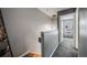 Upstairs hallway featuring plush carpeting and access to other rooms in the house at 1150 Inca St # 43, Denver, CO 80204