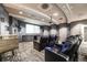 Enjoy movies in this home theater with a large screen, comfortable seating, and modern lighting at 1150 Inca St # 43, Denver, CO 80204