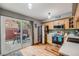 Bright kitchen featuring stainless steel appliances and access to the patio for outdoor dining at 1150 Inca St # 43, Denver, CO 80204
