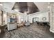 Inviting lobby area with modern seating, a fireplace, and stone accents at 1150 Inca St # 43, Denver, CO 80204