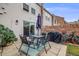 Outdoor patio featuring a table, chairs, grill, and sliding door to the home at 1150 Inca St # 43, Denver, CO 80204