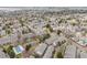 Aerial view of neighborhood featuring mature trees, common green spaces, pool, and tennis courts at 15149 E Princeton Pl # D, Aurora, CO 80014