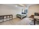 Basement bedroom featuring a single bed and carpeted floor at 15149 E Princeton Pl # D, Aurora, CO 80014