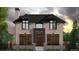 Charming two-story brick home with black framed windows and a manicured front yard at 1193 S York St, Denver, CO 80210