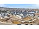 Panoramic aerial view of a residential area, featuring modern homes, landscaping, and a well-planned community layout at 8055 Navajo River Loop # B, Littleton, CO 80125