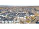 Extensive aerial view of a new home construction in a Primary-planned community showcasing contemporary home design at 8055 Navajo River Loop # B, Littleton, CO 80125
